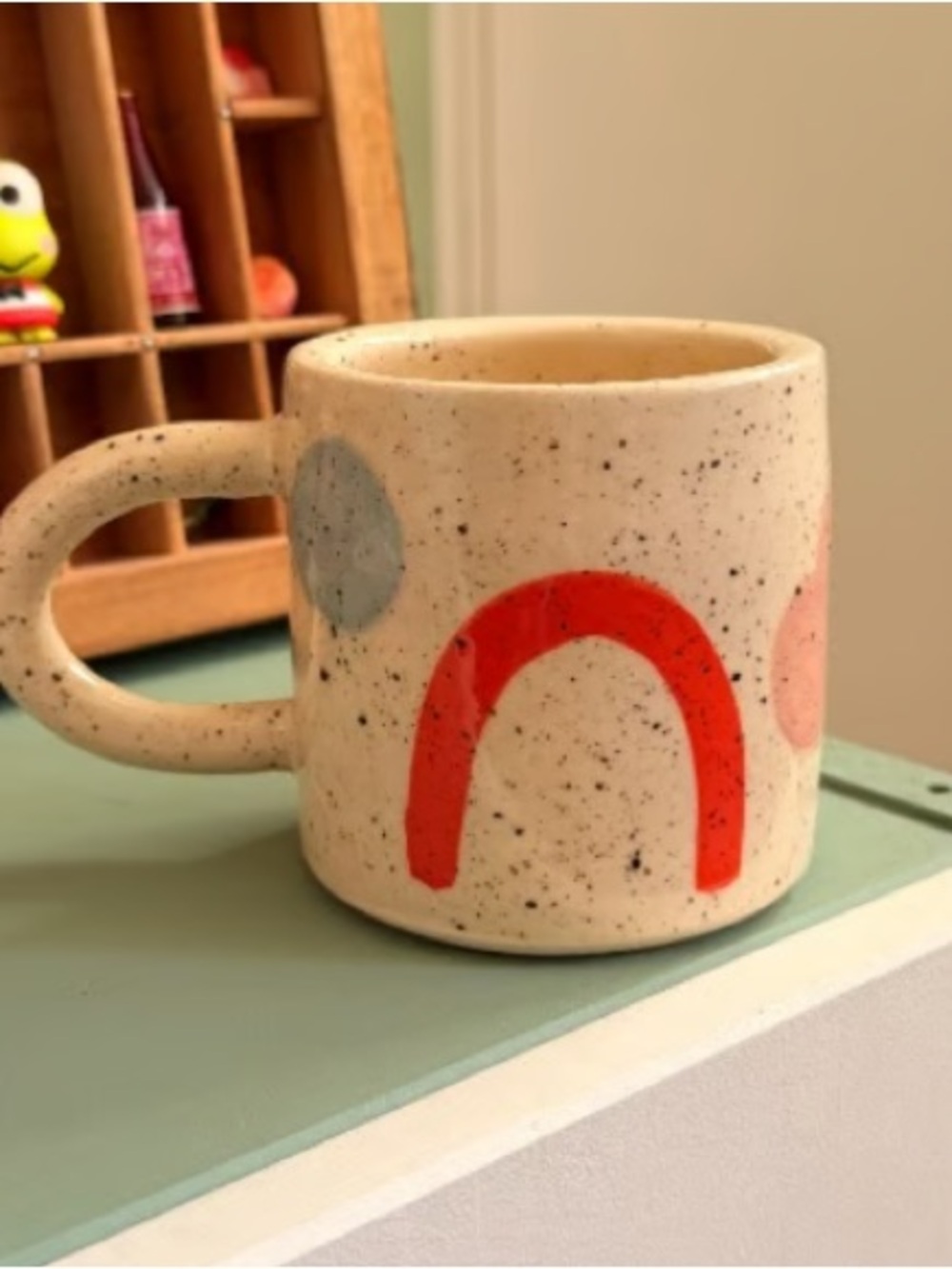 Speckled Ceramic Mug with Red Arch Accent - Unbranded